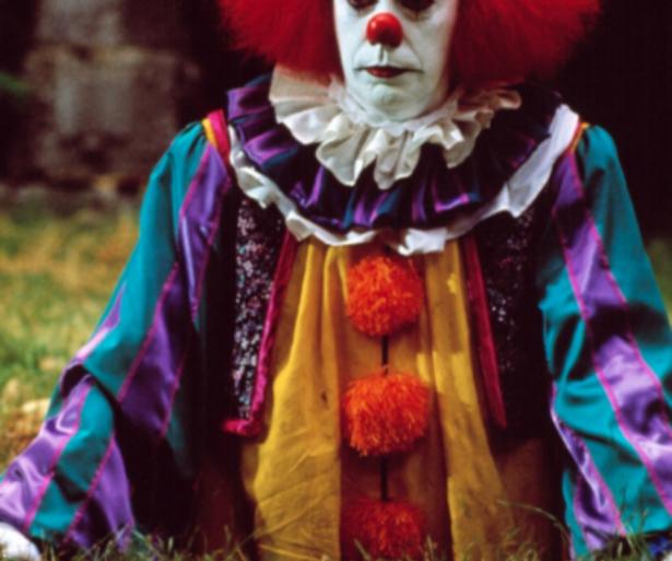 Tim Curry as Pennywise