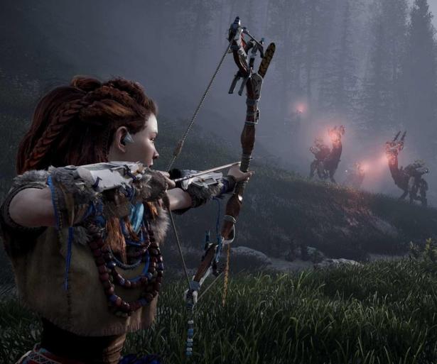Aloy using a Hunter Bow to take down two Grazers