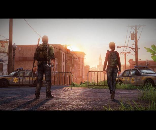 Ellie and Joel walk towards the sunset through an abandoned town in The Last of Us.